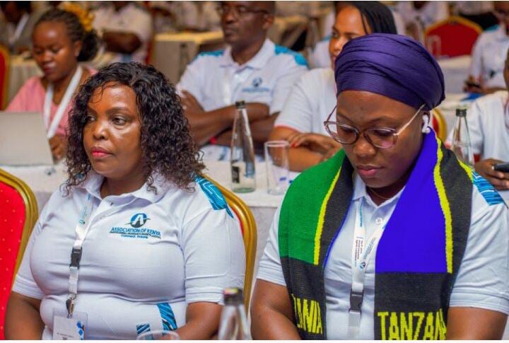 Maggie with East Africa Women in Insurance representative